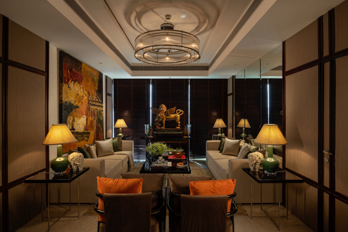 A Visionnaire living room featuring a curved upholstered sofa